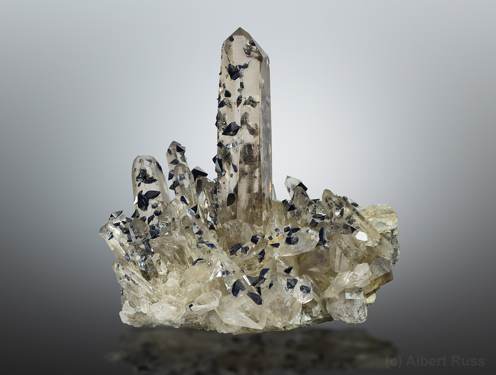 Clear quartz cluster covered by dozens of anatase crystals from Hardangervidda, Norway