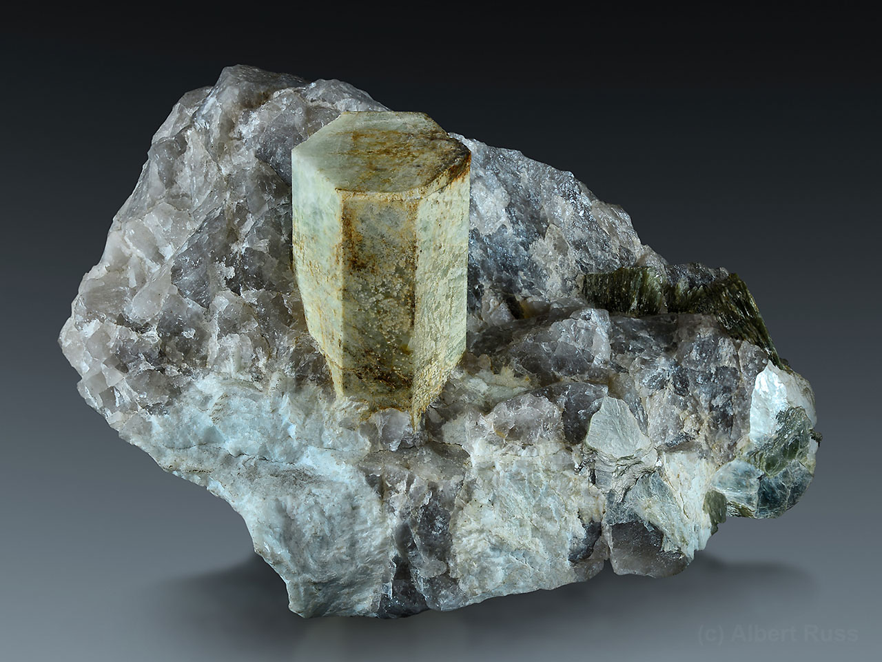 Typical apple green common beryl in blocky pegmatite from Maršíkov, Czech Republic