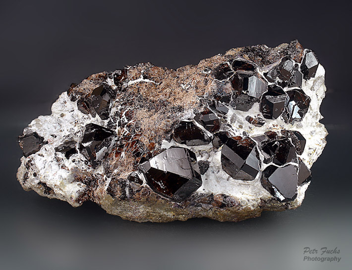 Perfect cassiterite crystals on matrix from Krupka, Czech Republic