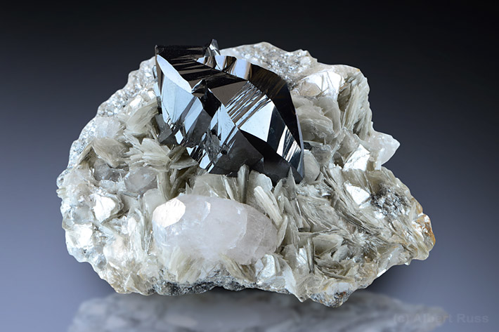 Cassiterite and beryl crystals on mica matrix from Pingwu Mine, Sichuan Province, China