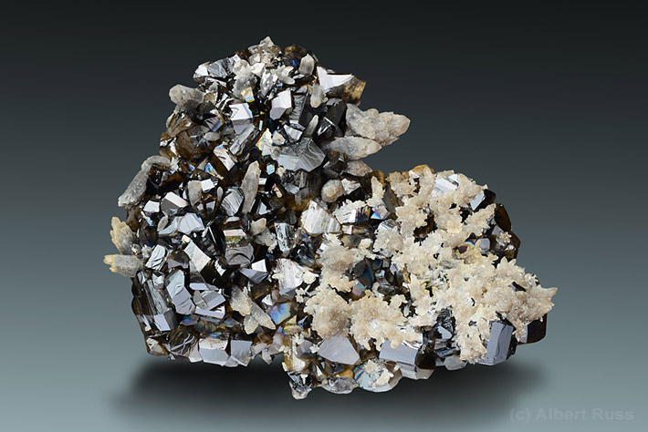 Gemmy cassiterite crystals on quartz matrix from Viloco Mine, Loayza, Bolivia