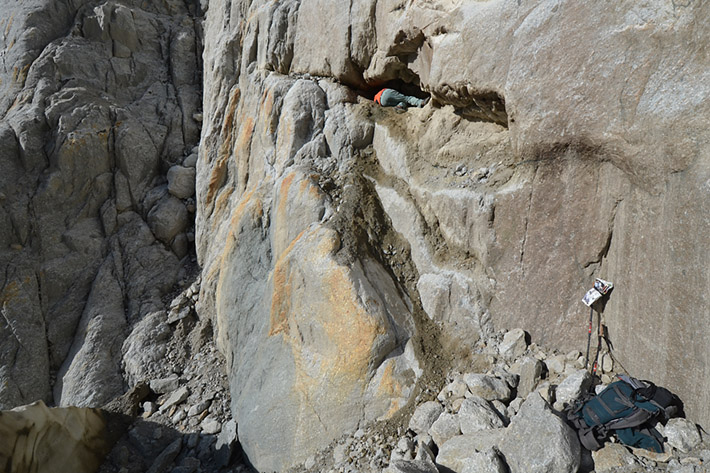 Mineral collector working on the huge crystal pocket in the French Alps