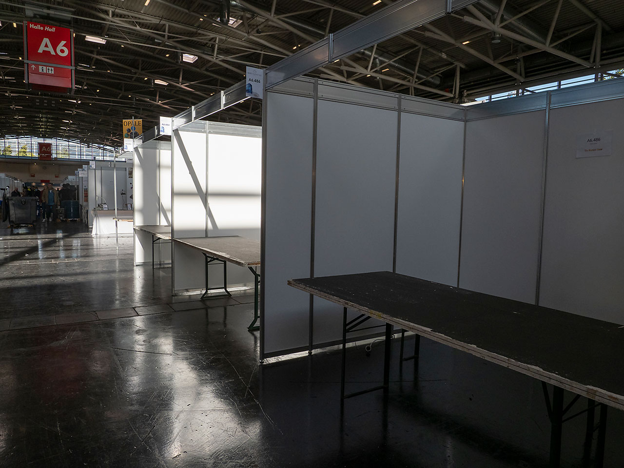Rows of empty stands in A5 exhibition hall