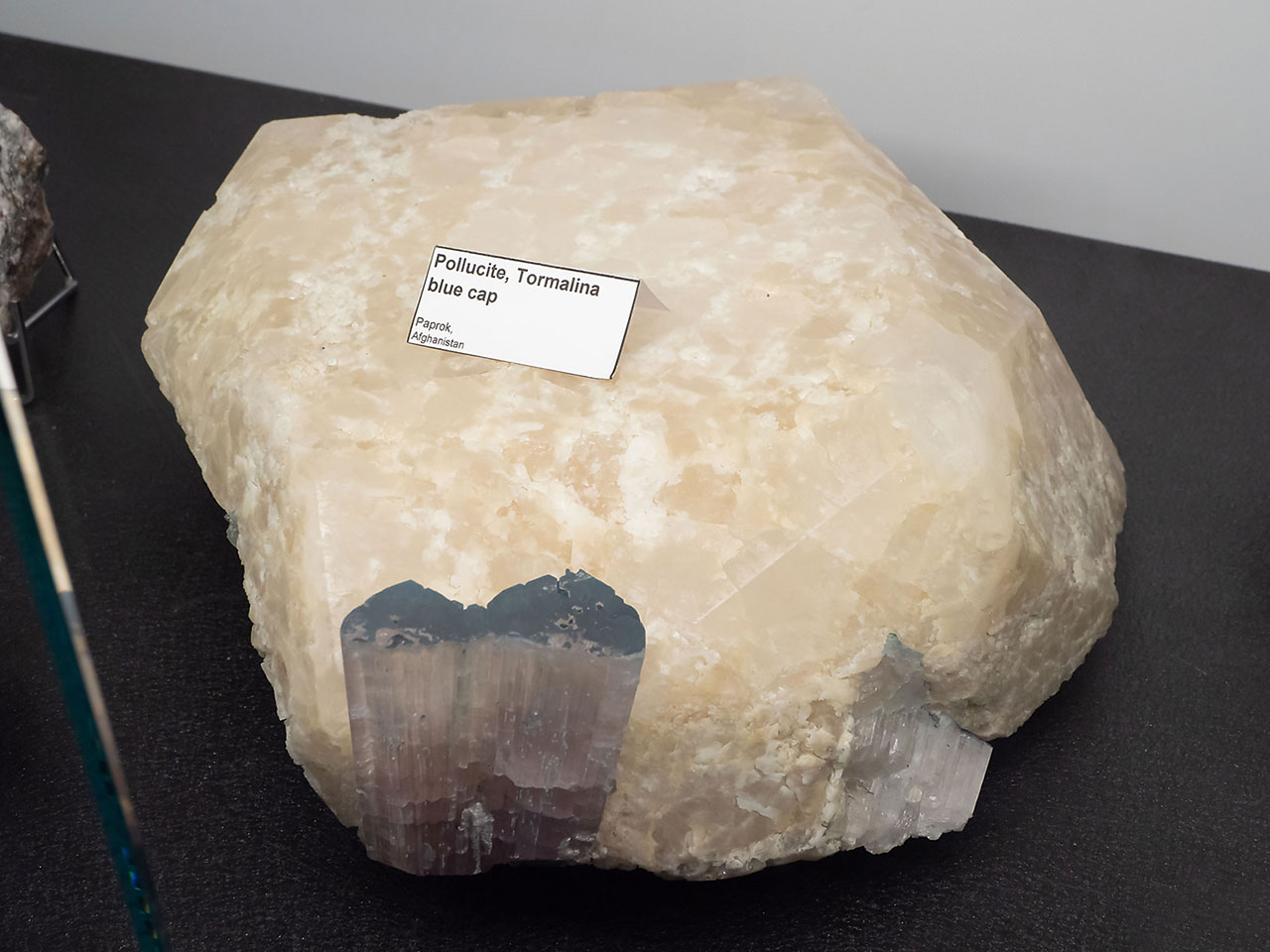 Huge and well defined pollucite crystal with lithium tourmalines from Paprok, Afghanistan