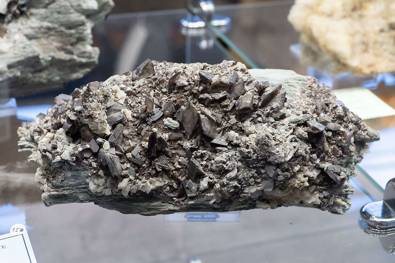 Brown titanite with adularia from Puiva, Ural Mts., Russia