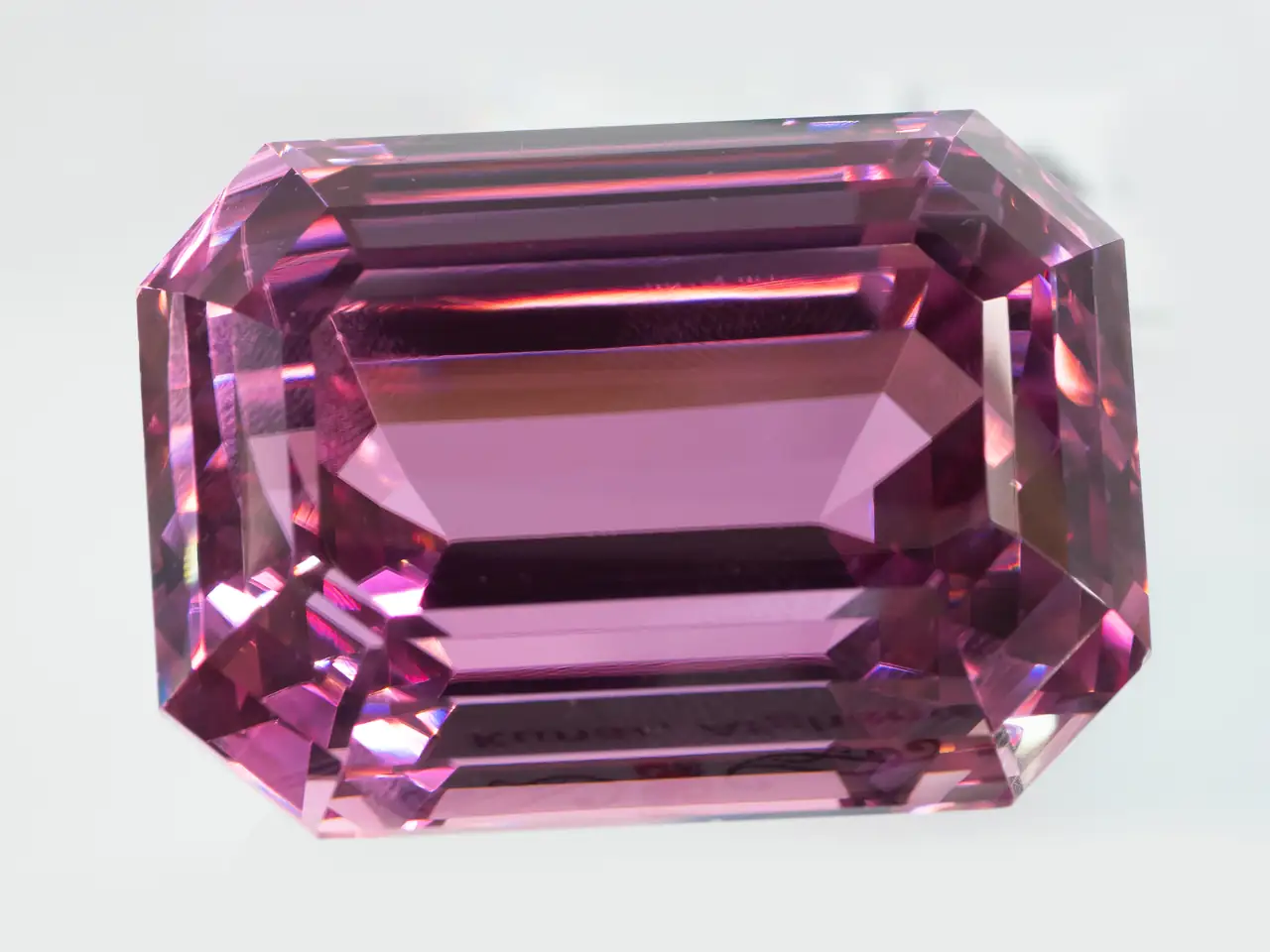 Faceted sporudmene (var. kunzite) with perfect deep pink-purple color.