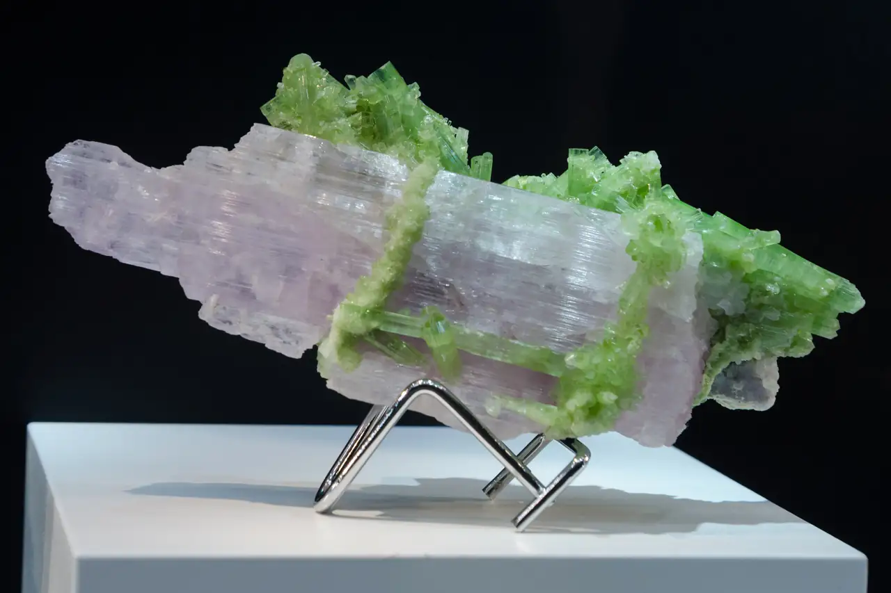 Pink spodumene (var. kunzite) with bright green tourmaline from Afghanistan