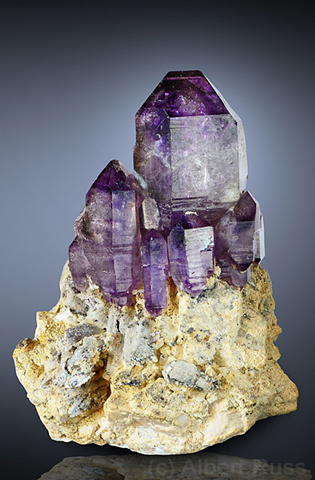 Deep purple amethyst quartz crystals on matrix from Namibia