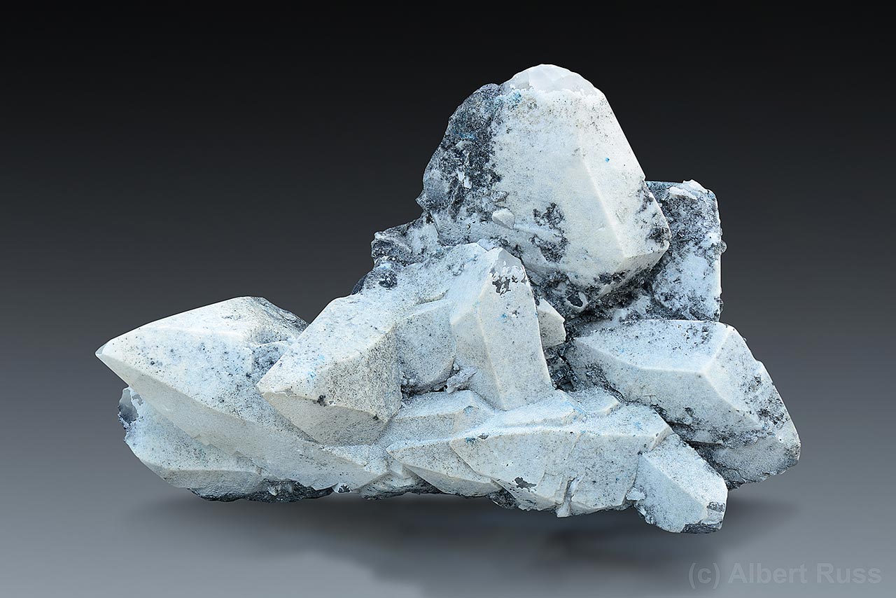 Cluster of white anglesite crystals from Tsumeb, Namibia