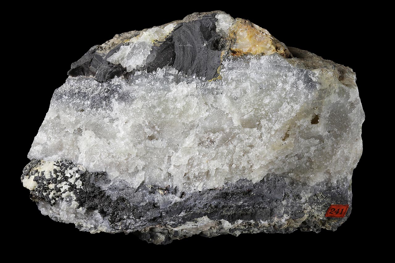Mineral vein with gray native arsenic and white quartz from Schneeberg, Germany