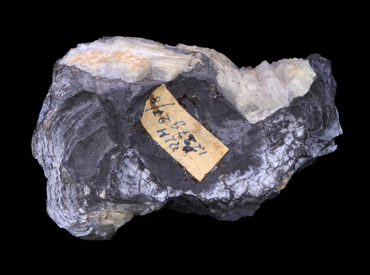Layered botryoidal gray native arsenic and white calcite