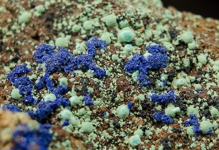 Detail of blue azurite crystals associated with green malachite spheres from Spania Dolina, Slovakia