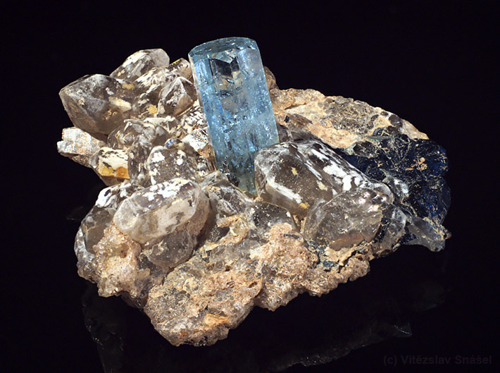 Terminated aquamarine crystal on smoky quartz matrix from Erongo, Namibia
