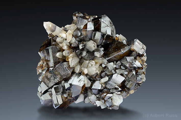 Gemmy cassiterite crystals on quartz matrix from Viloco Mine, Loayza, Bolivia