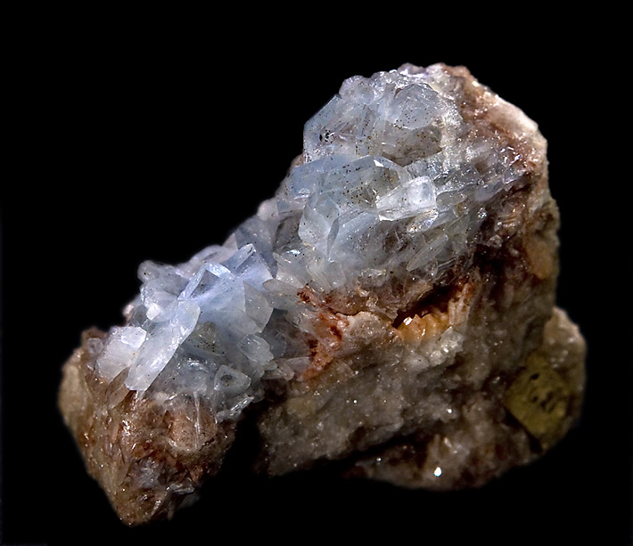 Cluster of pale blue crystals of barytocelestine from Bristol in England
