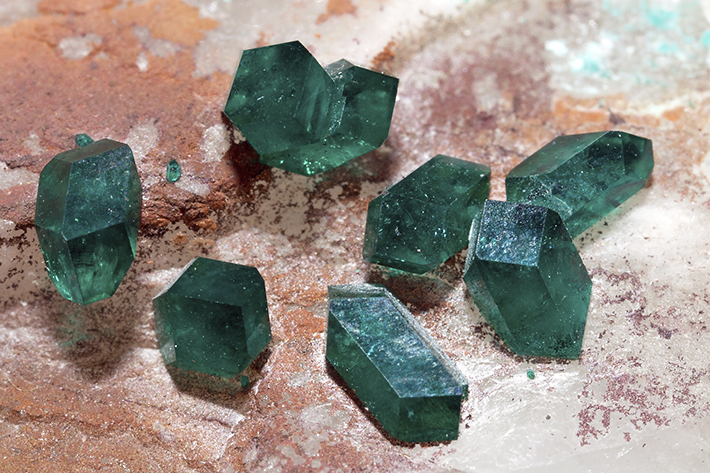 Well shaped green dioptase crystals on quartz from Kaokoveld, Namibia