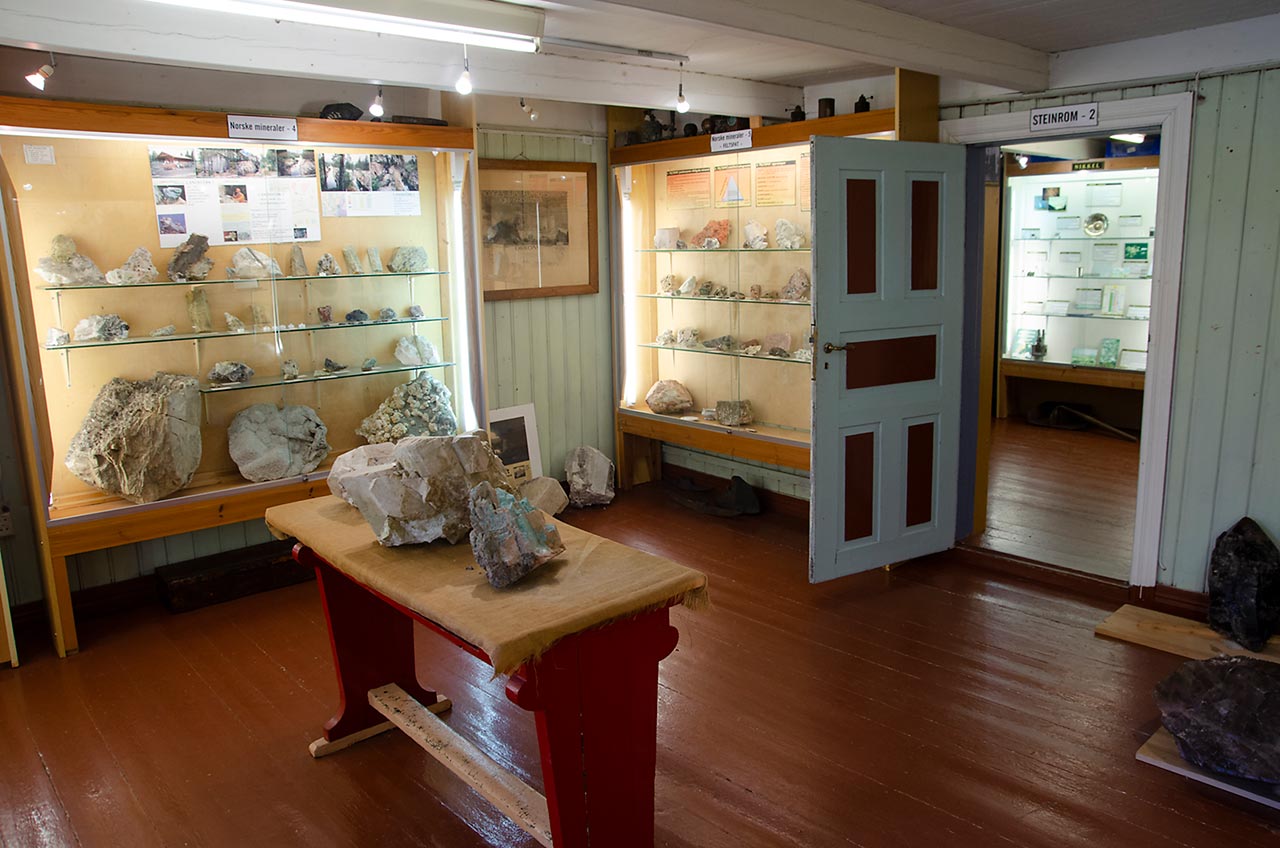 Norwegian mineral display with huge feldspars and beryls