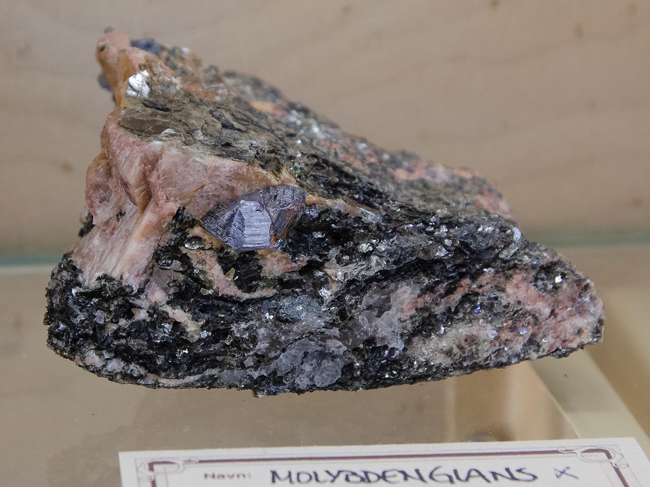Well shaped molybdenite crystal in matrix from Bandaksli, Norway