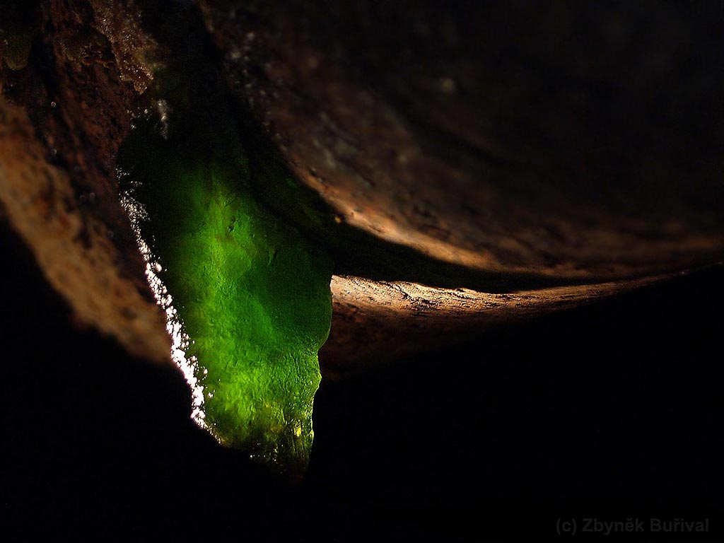 Melanterite stalactite hanging from the iron pipe in the underground mine in Jáchymov, Czech Republic