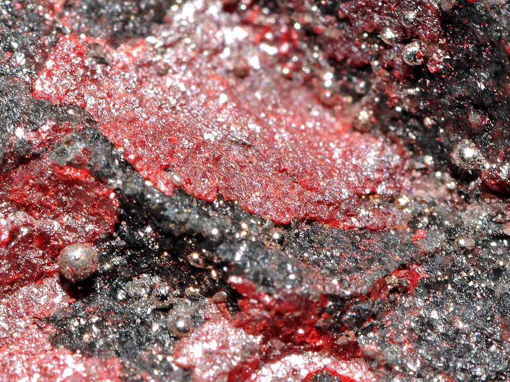 Rich mercury ore with red cinnabar and native mercury spheres from Spain