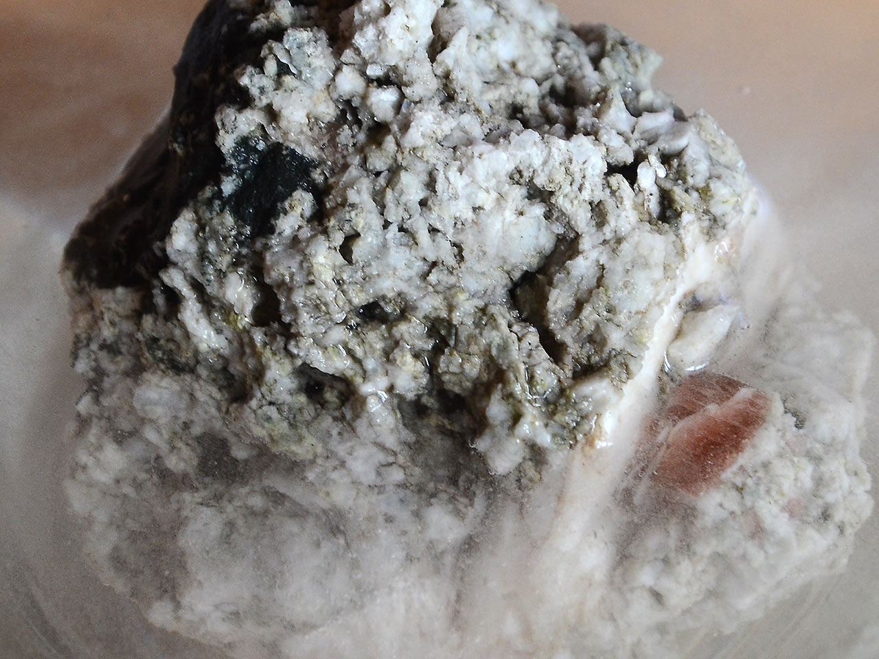 Removing excess calcite from mineral specimen by hydrochloric acid
