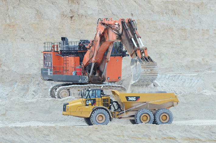Huge mining machines in the open pit mine