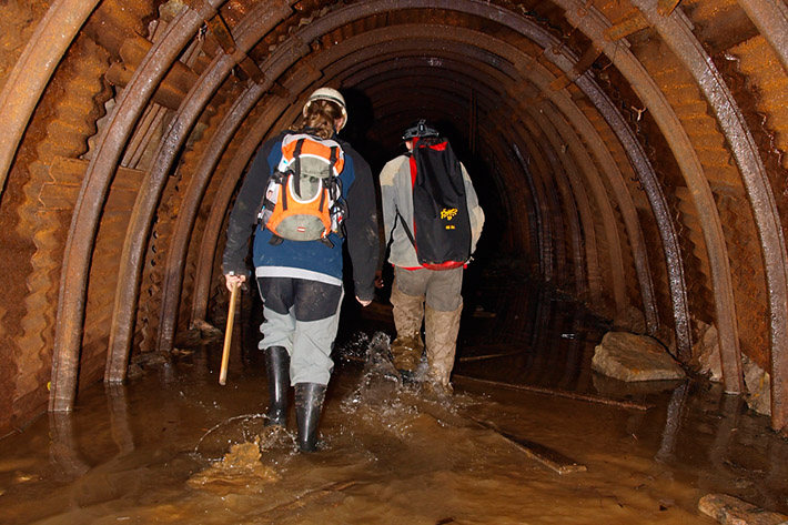 Mineral collectors in the abandoned underground mine