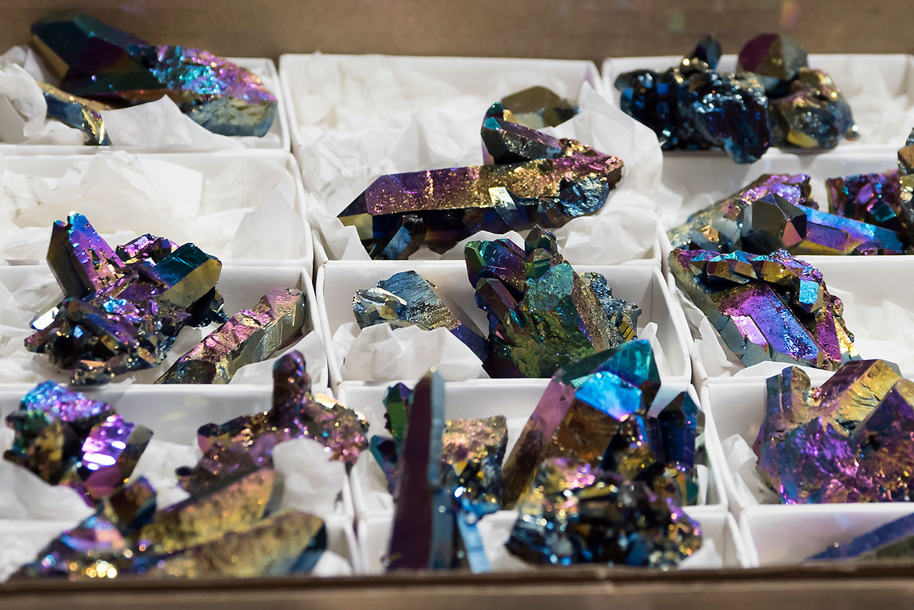 Ordinary quartz clusters coated by titanium vapors under vacuum are sold as Titanium Rainbow Quartz