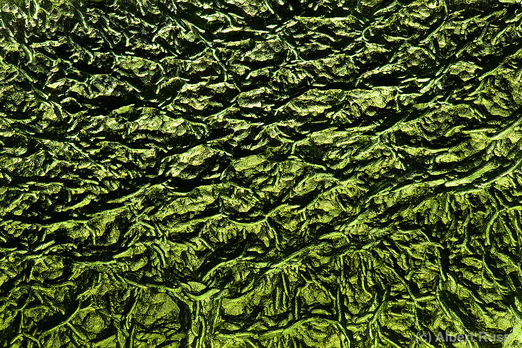 Detail of typical moldavite sculptation from Dobrkovska Lhotka, South Bohemia, Czech Republic