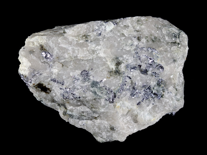Small flakes of molybdenite mineral disseminated in quartz vein from Barbora adit in Krupka, Czech Republic