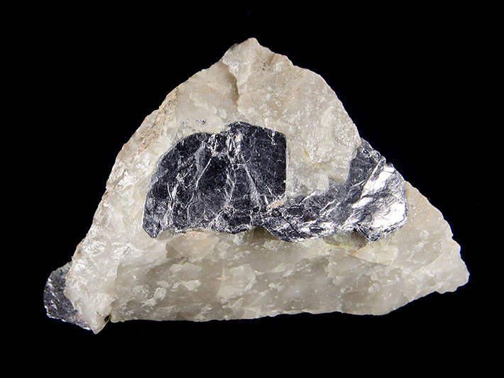 Crystals of molybdenite mineral in quartz from Krupka in Czech Republic