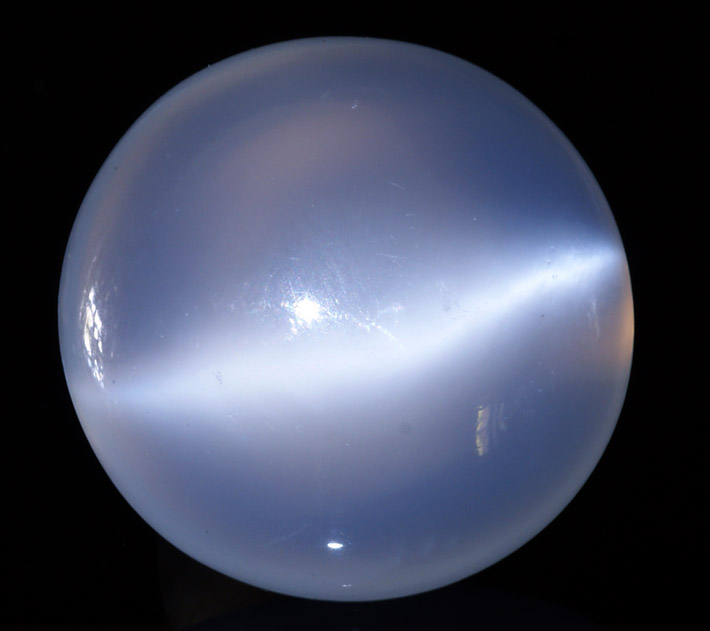 Polished sphere of moonstone feldspar