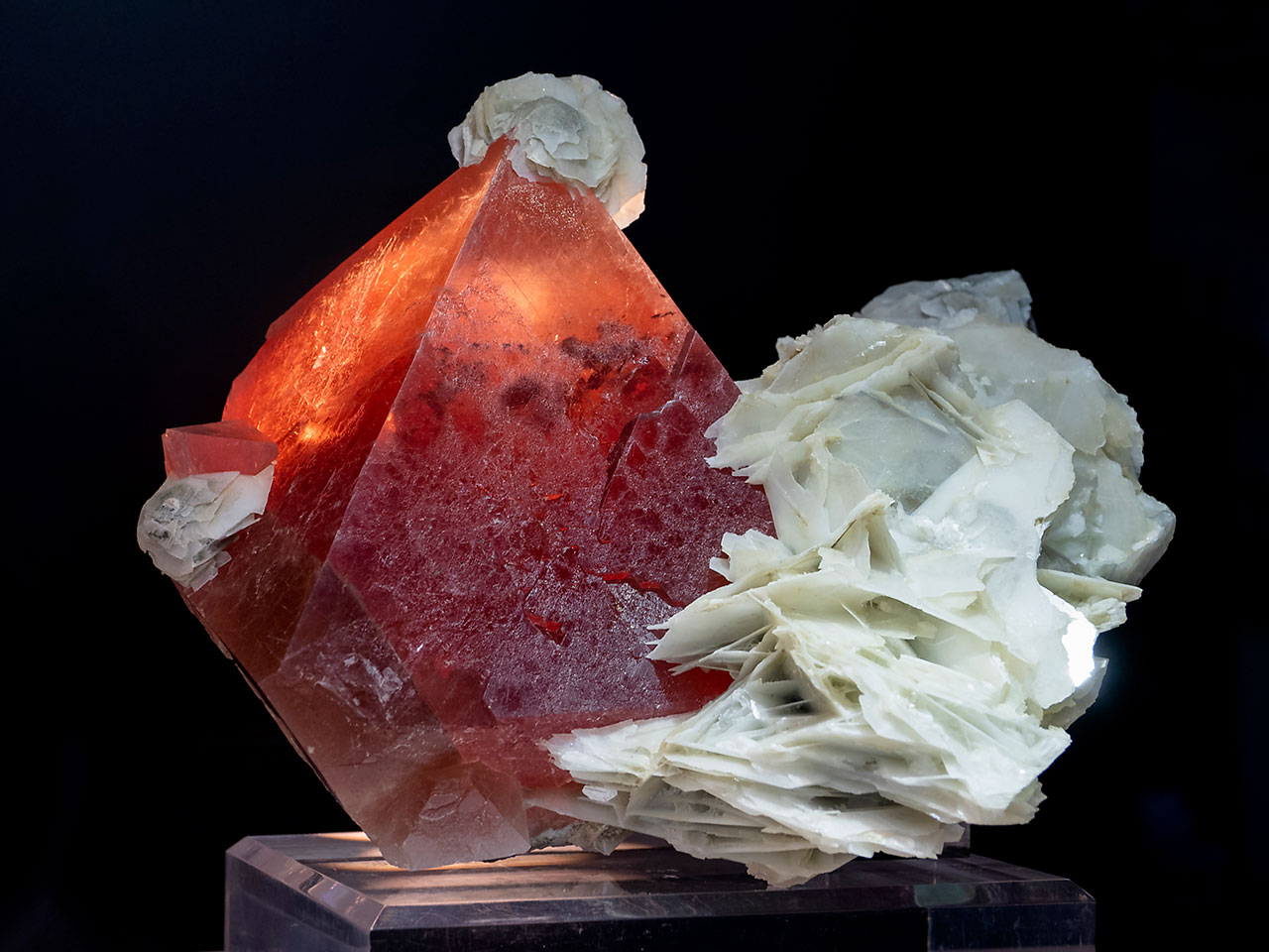Huge red fluorite crystal with paper calcite from Huanggangliang Mine, Inner Mongolia, China