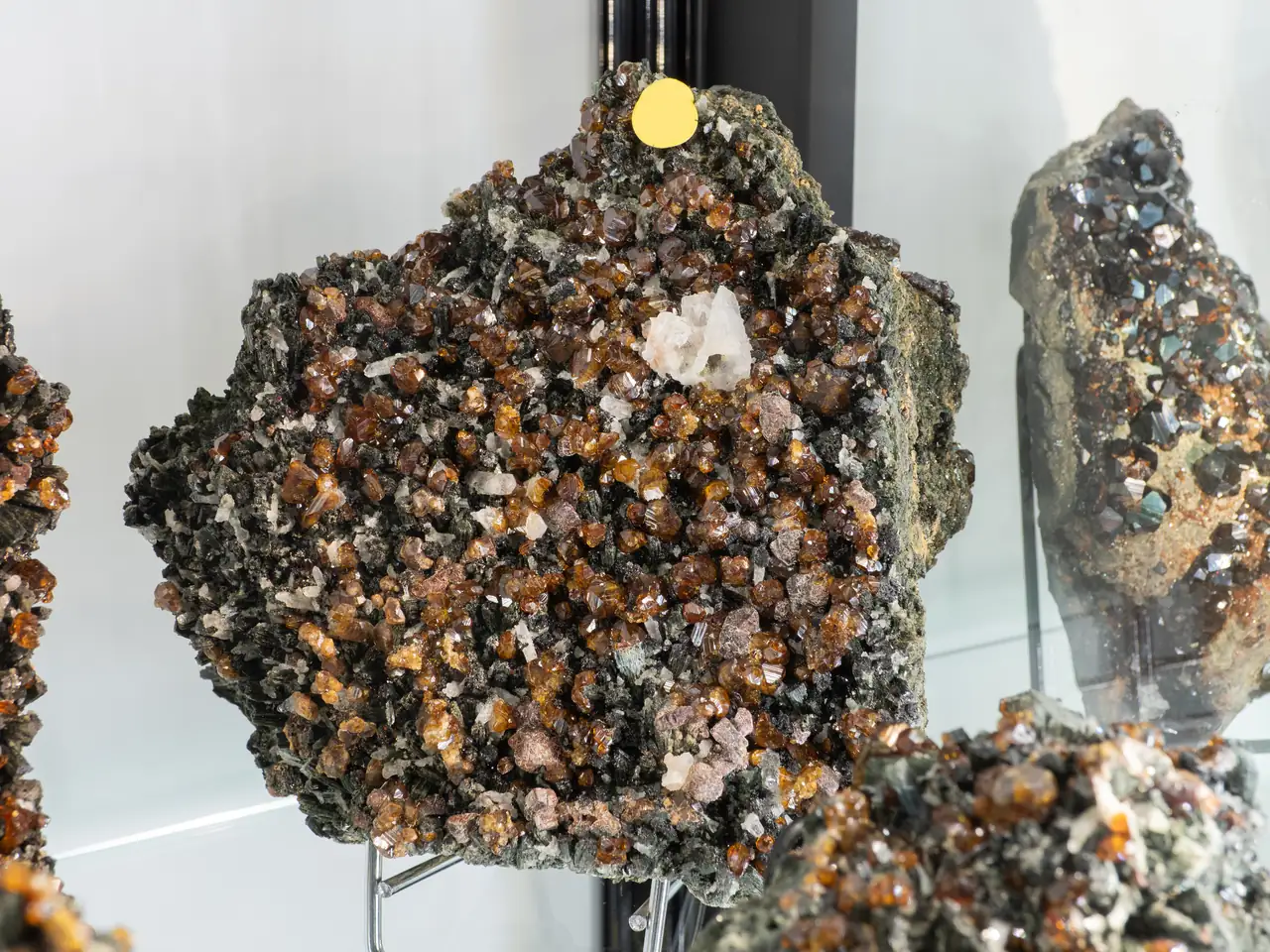 Cluster of orange andradite garnet crystals from Hormozgan, Iran.