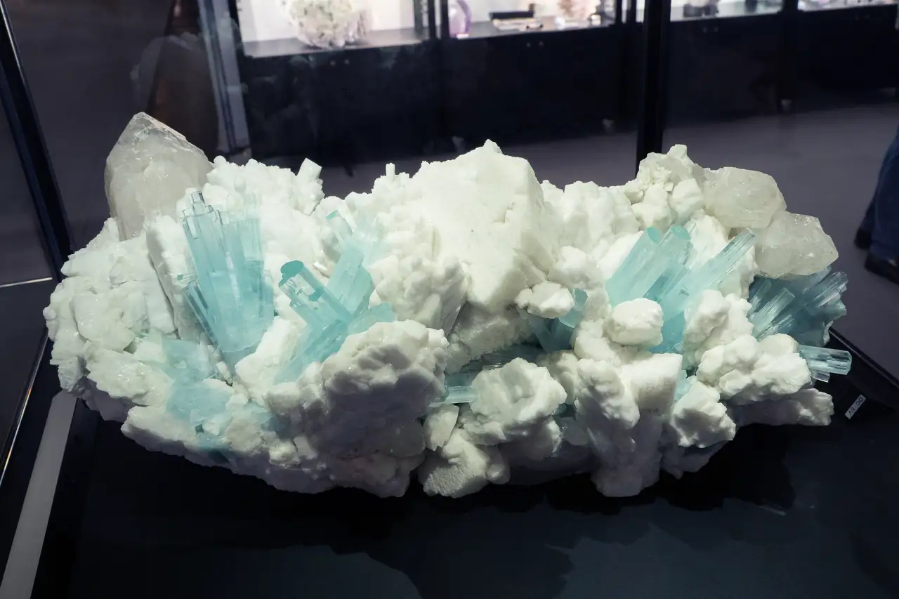 Very large cluster of feldspars, quartz and numerous aquamarine crystals from Pakistan.