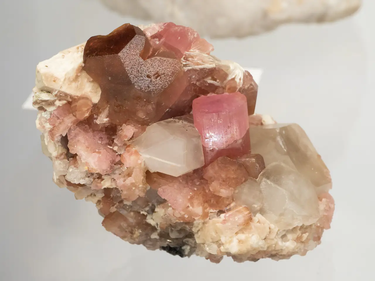 Pink rubellite tourmaline with quartz from Mogok, Myanmar.