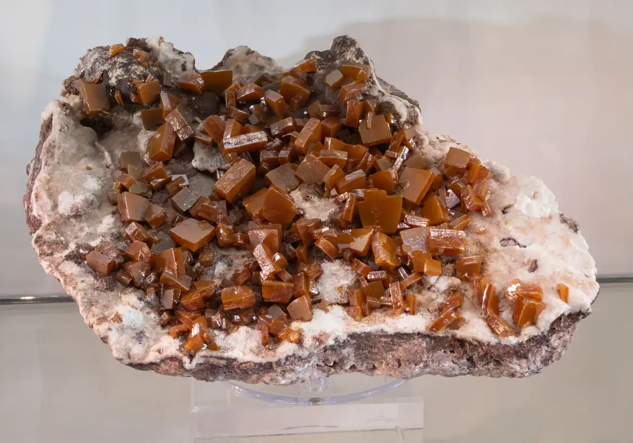 Flat orange wulfenite crystals from Erupción Mine, Los Lamentos, Chihuahua, Mexico.