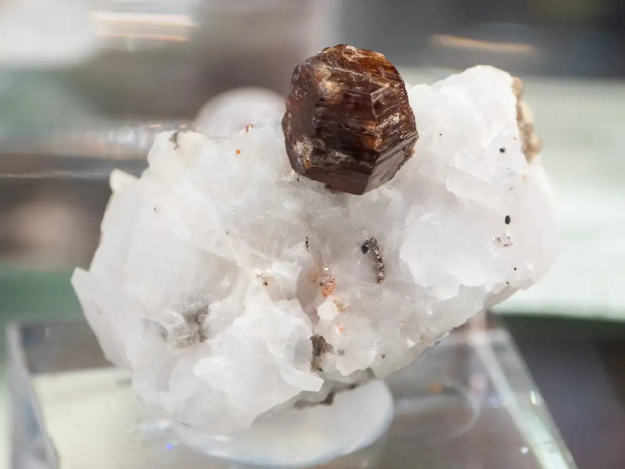 Brown hibonite crystal (Ca-Al oxide) on matrix from Mogok, Myanmar