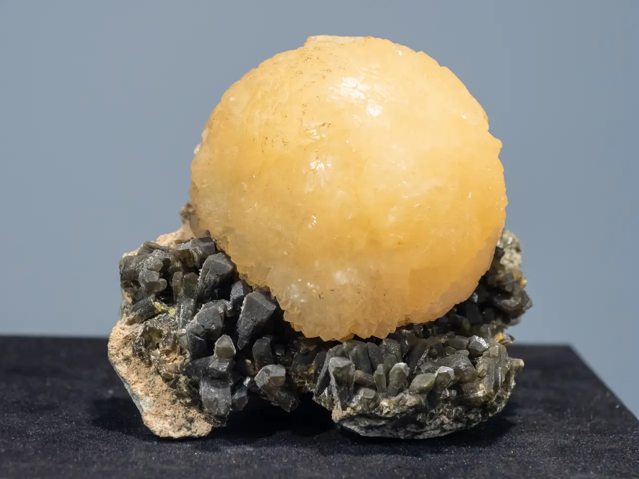 Yellow stilbite sphere on green epidote from Diamonkara, Kayes Region, Mali