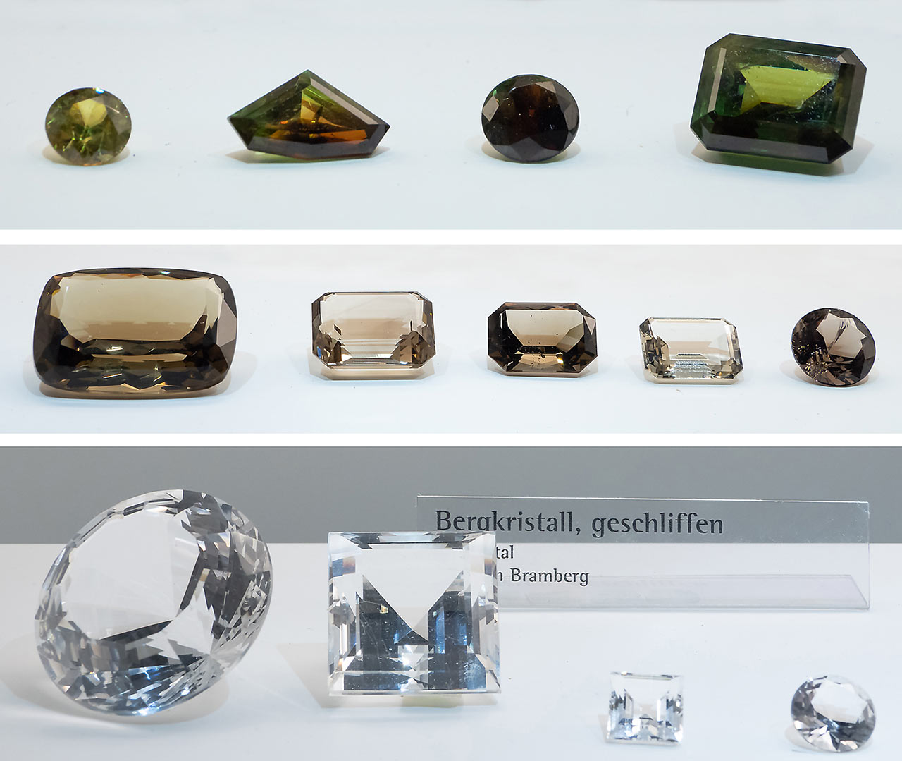 Various faceted gems made of titanite, smoky quartz and clear quartz