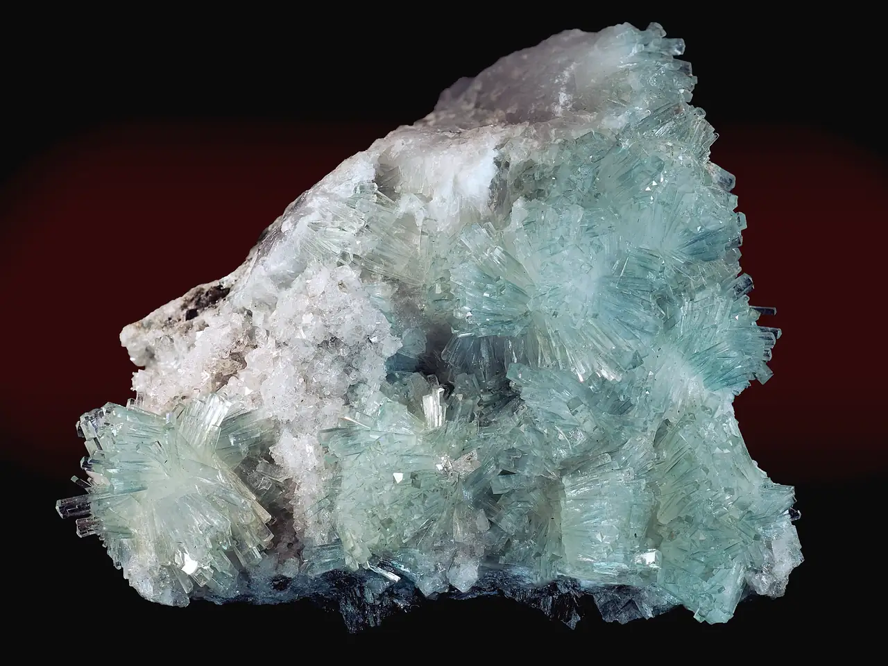 Green natrolite crystals with clear clear amicite from Kirovskii apatite mine, Khibiny Massif, Murmansk Oblast, Russia