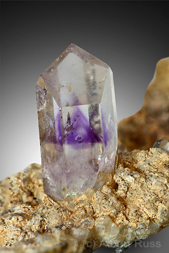 Rock crystal quartz with phantom amethyst inside from Namibia