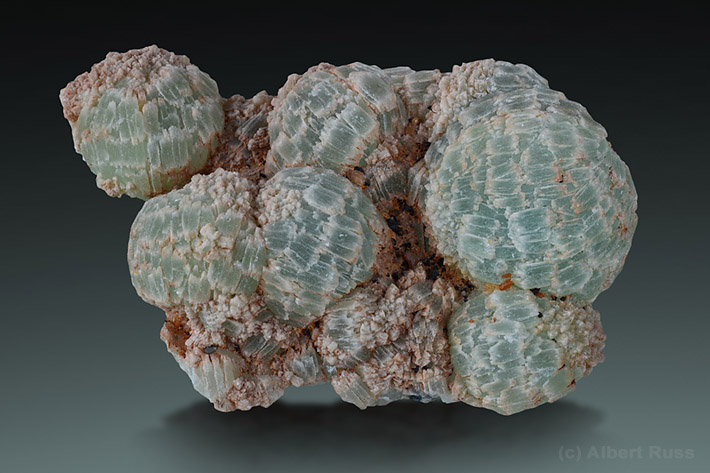 Botryoidal aggregates of pale green prehnite crystas from Djebel Mehl in Morocco