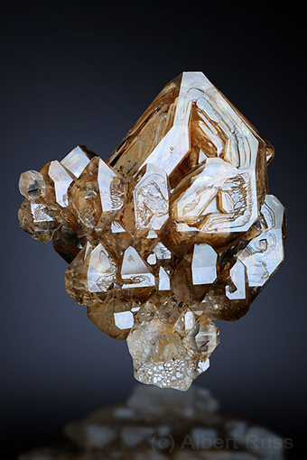 Sketeletal and scepter quartz crystal with clay inclusions from Goboboseb in Namibia