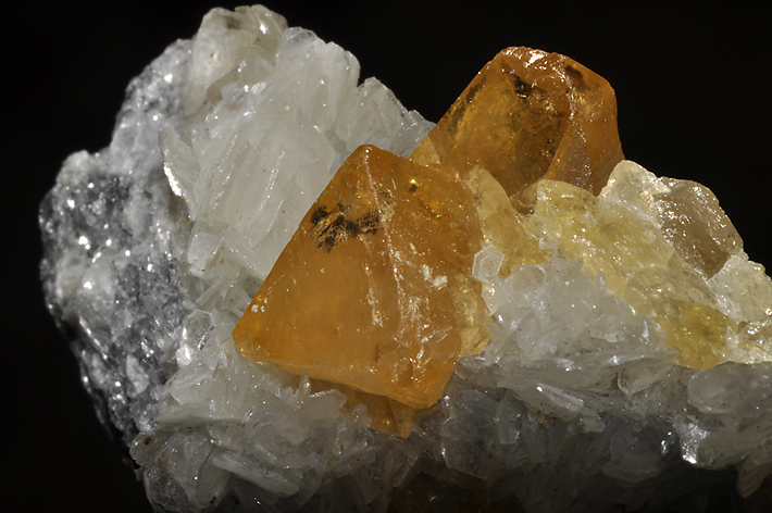 Orange crystals of scheelite on quartz from Yaogangxian Mine, Hunan Province, China
