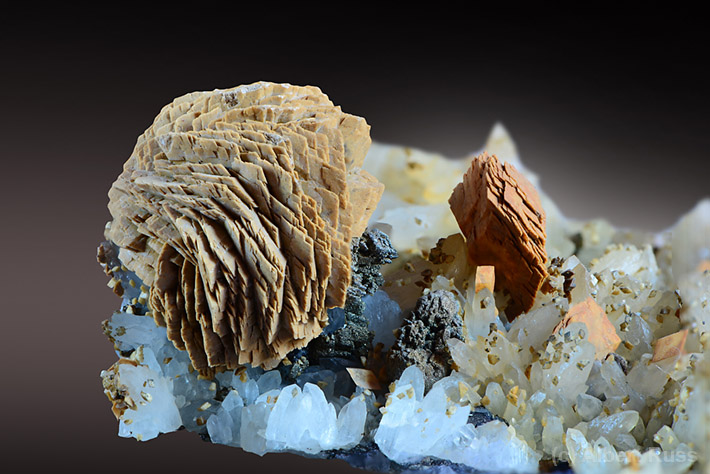 Rosette-shaped aggregate of pale brown curved and flat siderite crystals from Romania