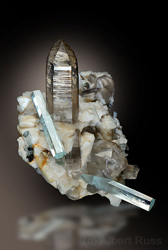 Aesthetic cluster of smoky quartz crystals with feldspars and aquamarine from Pakistan
