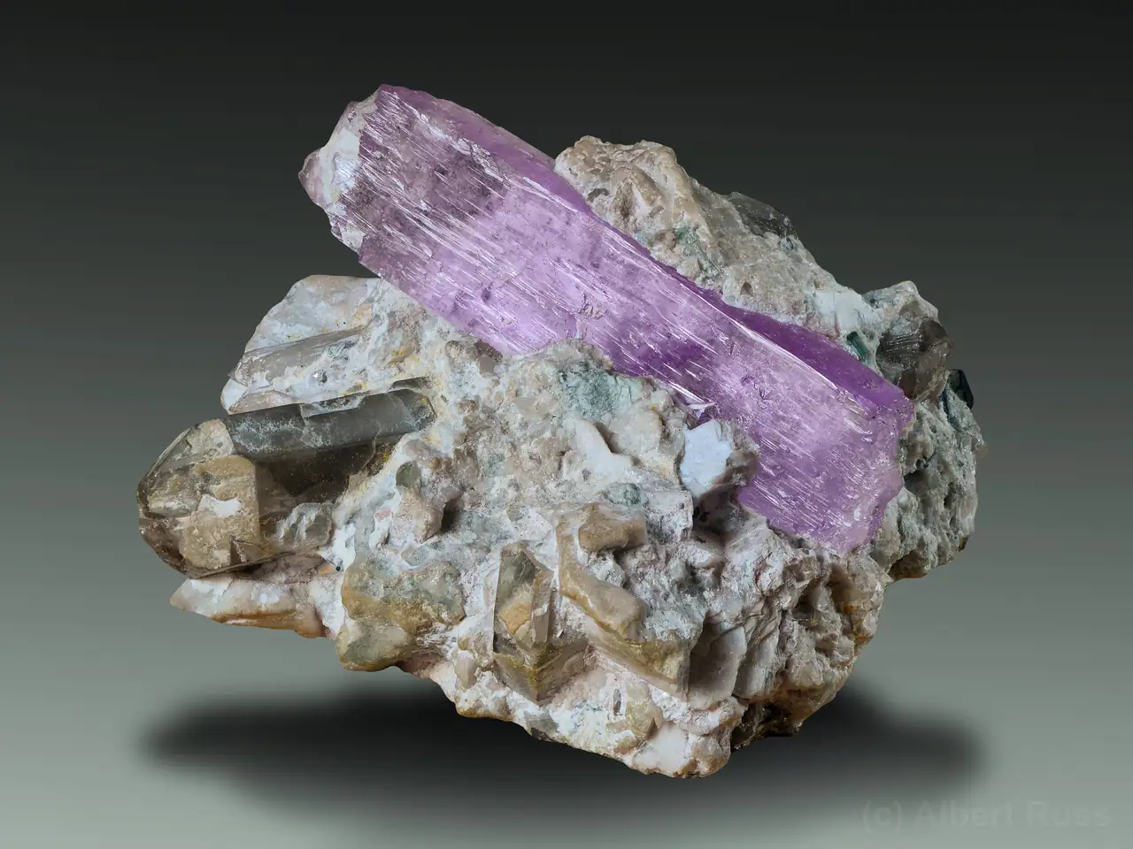 Pink spodumene (var. kunzite) crystal with quartz and unspecific clay minerals from Laghman, Afghanistan