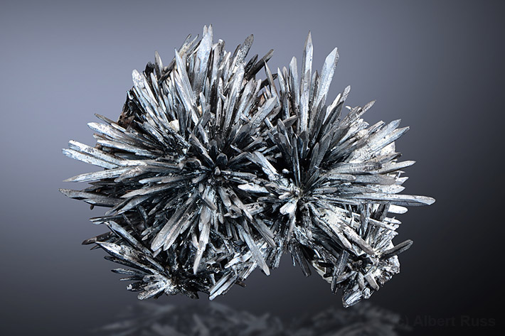 Cluster of needle-shaped stibnite crystals from Romania