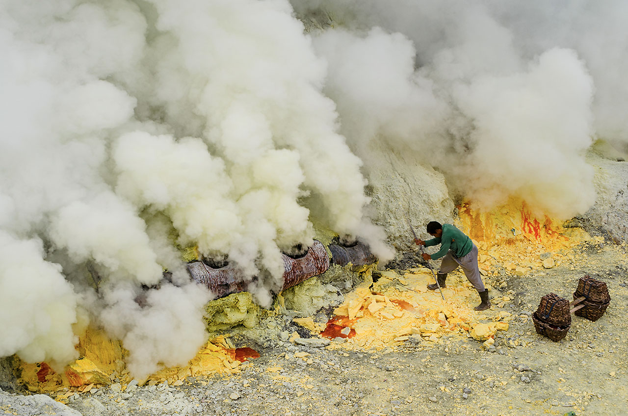 Artisanal mining of sulphur from fumaroles inside Kawah Ijen crater, Java, Indonesia. 